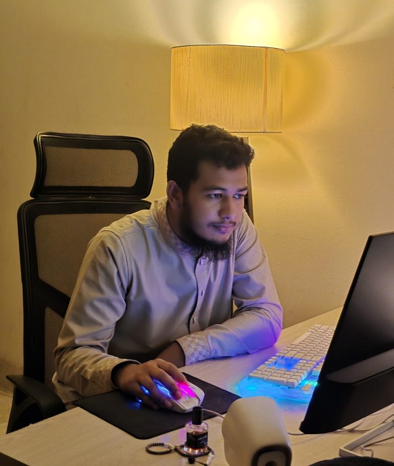 Abu Obaida working at his desk
